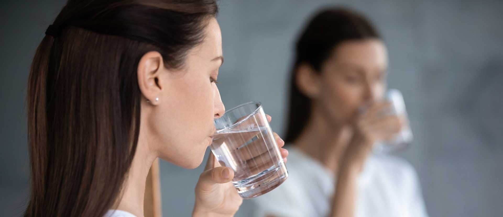 Woman Drinking Water Flipped